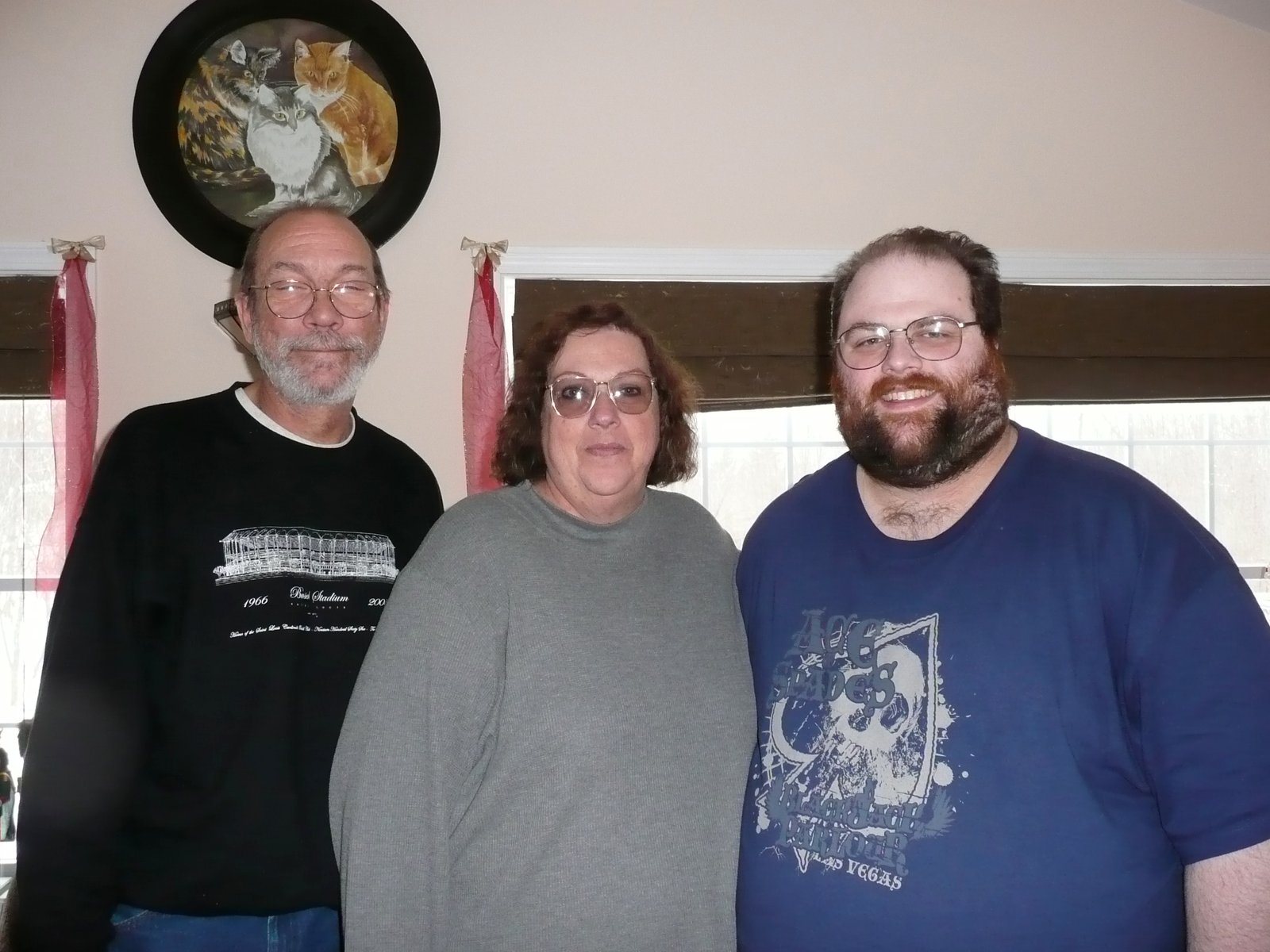 Father, mother and obese adult son.